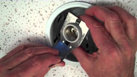 unhooking junction box from recessed fixture|removing recessed light fixture box.